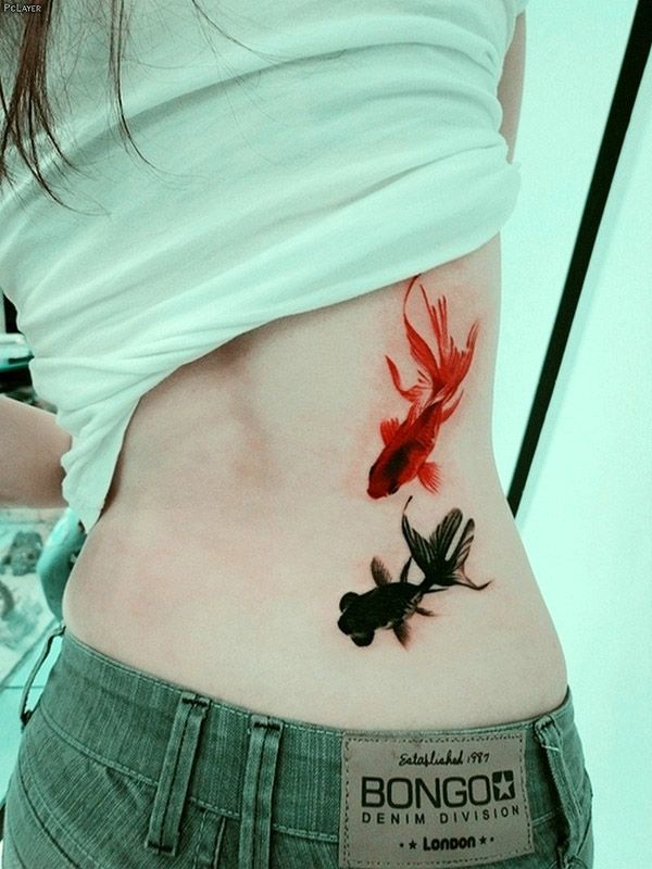 realistic tattoo black and red fish