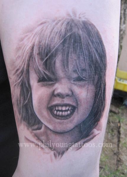 realistic tattoo smiling kid