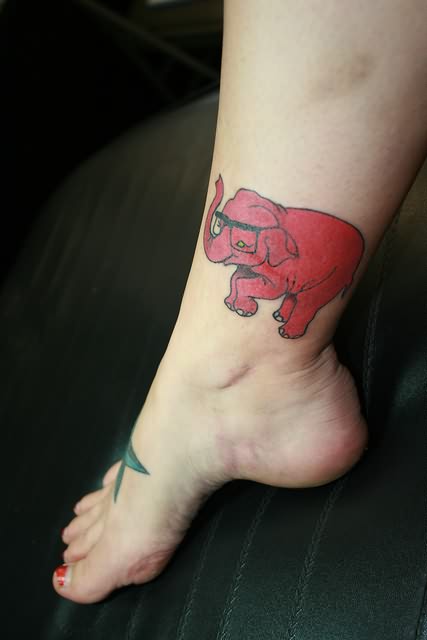 red ink tattoo elephant on ankle