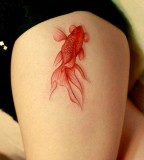 red ink tattoo goldfish