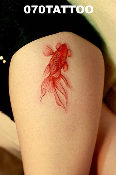 red ink tattoo goldfish