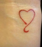 red ink tattoo minimalistic heart