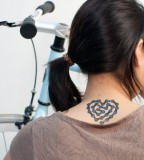 travel tattoo bike chain heart