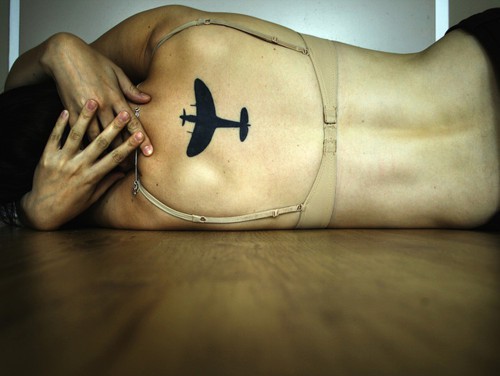 travel tattoo black plane