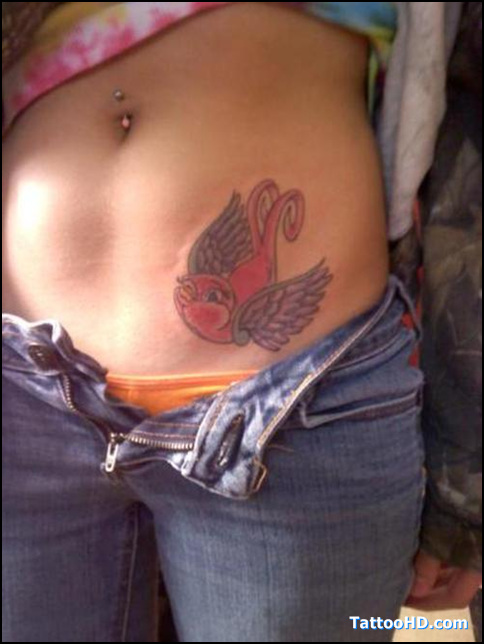 beautifully placed pastel bird tattoo