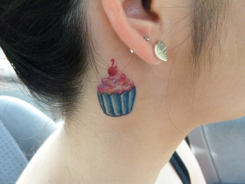 behind ear tattoo pink cupcake