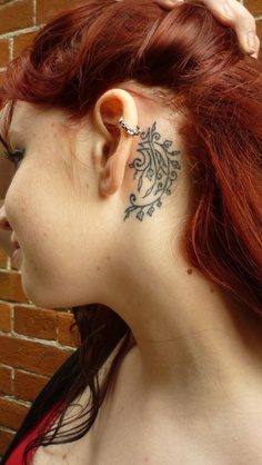 behind ear tattoo red haired girl