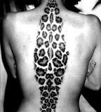 black leopard print tattoo rhombus on back