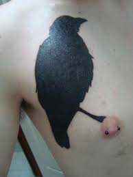 blackwork tattoo big bird on nipple
