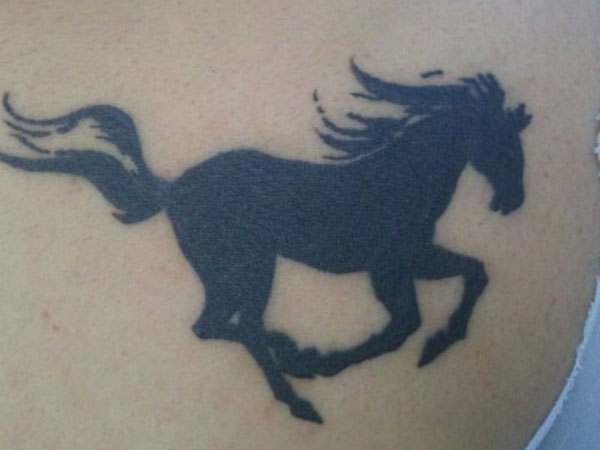 blackwork tattoo stallion