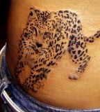 cheetah tattoo on hip