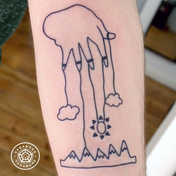 childlike drawing mountains and hand tattoo