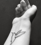colibri tattoo on wrist