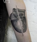 divided heart tattoo by valentin hirsch