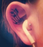 inside ear tattoo musical note