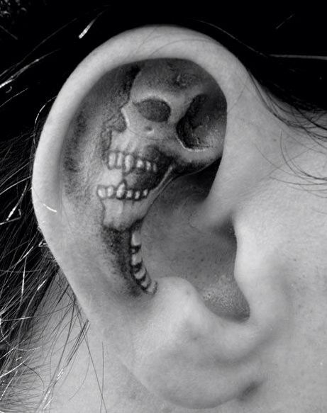 inside ear tattoo skeleton