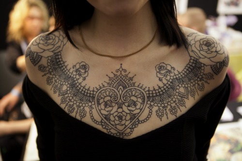 lace tattoo roses chest piece
