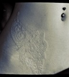 lace tattoo white ink belly