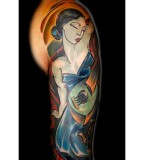 lady with instrument tattoo by bugs