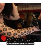 leopard print tattoo on arm in process