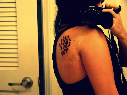 leopard print tattoo on shoulder