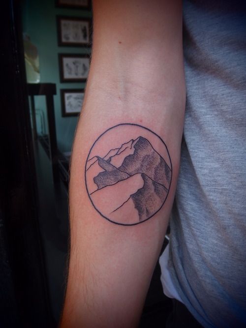 mountains in a circle tattoo
