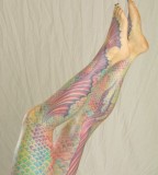 pastel mermaid tail tattoo