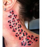red cheetah print tattoos on neck