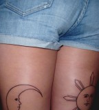 sun tattoo design sun and moon on back thigh