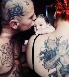 tattooed couple family photo