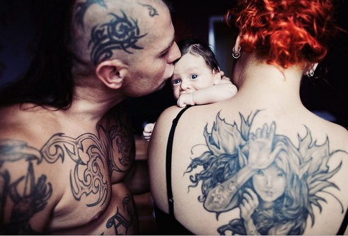 tattooed couple family photo