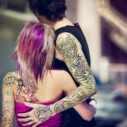 tattooed couple girl in pink