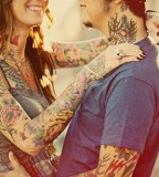 tattooed couple sunny day