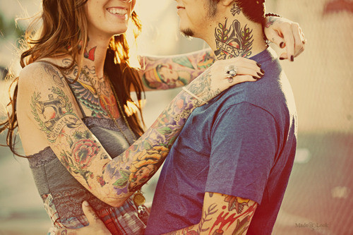 tattooed couple sunny day