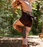 tattooed girl with dreadlocks hippie girl dancing butterfly tattoo