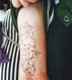 wrist tattoo abstract illusion