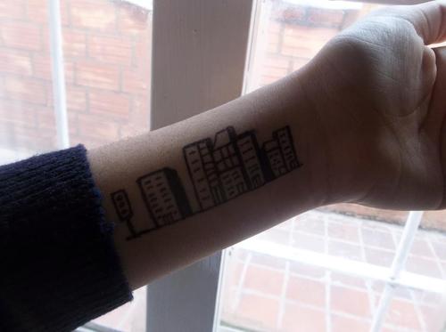 wrist tattoo buildings
