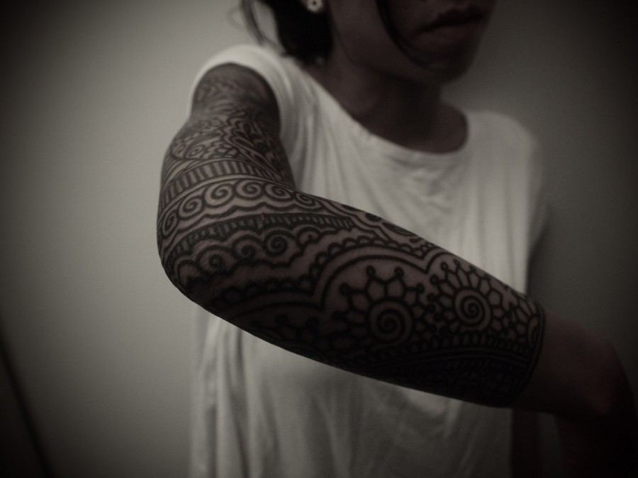 arm sleeve tattoo by guy le tattooer