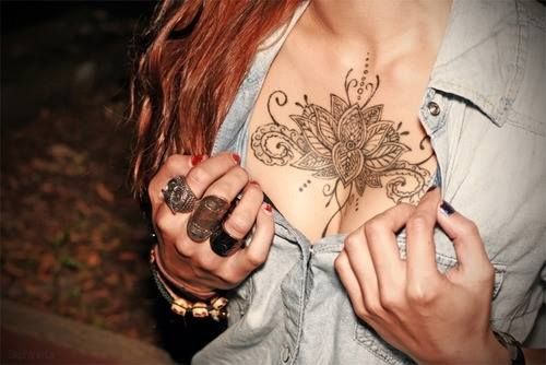 beautiful flower tattoo on chest