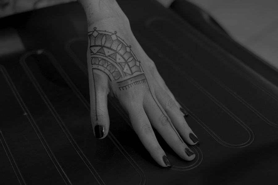 beautiful hand tattoo by jean philippe burton