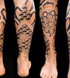 black and orange leg sleeve geometric tattoo