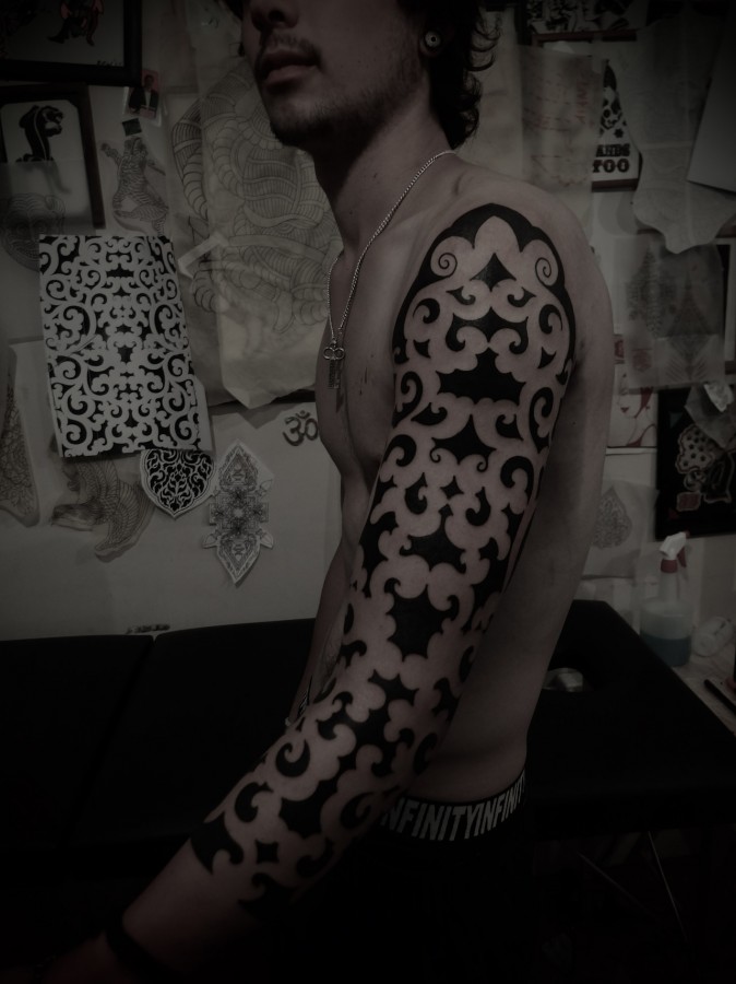 blackwork sleeve tattoo by guy le tattooer