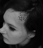 forehead tattoo by jean philippe burton
