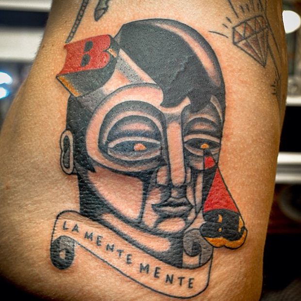 futuristic face tattoo by luca font