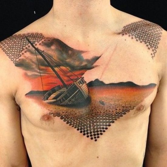geometric boat in dessert tattoo on chest