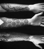 geometric tattoo sleeve stripes and flowers
