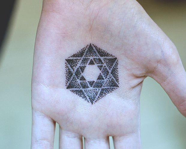 hand tattoo by diana katsko