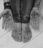 hands and feet snowflake tattoos by jean philippe burton