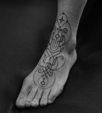 leg tattoo by jean philippe burton