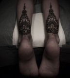 ornamental back leg tattoos by guy le tattooer